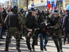 Задержание полицией на акции. Фото: Владимир Лапкин, Каспаров.Ru