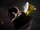 Космический аппарат New Horizons у астероида. Иллюстрация: www.iguides.ru