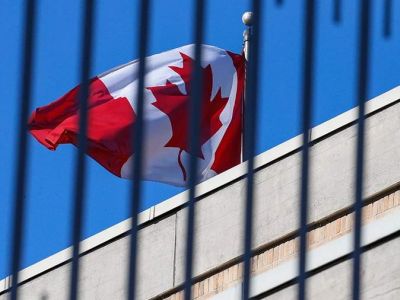 Флаг Канады. Фото: Roman Pilipey / EPA / ТАСС